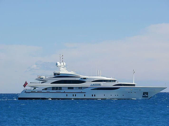 a large white boat in the water aboard NEXT CHAPTER Yacht for Sale