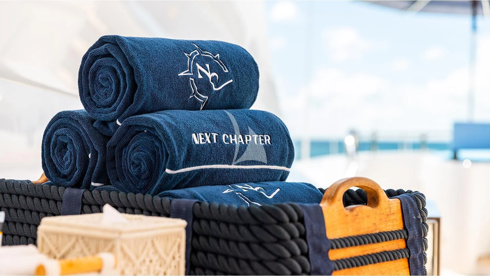 a hat on a stack of books aboard NEXT CHAPTER Yacht for Sale