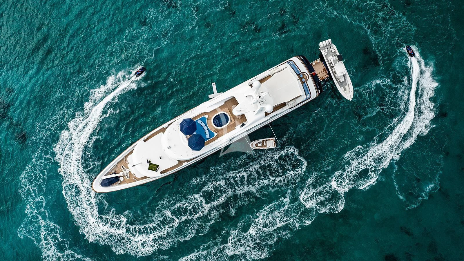 a helicopter flying over a body of water aboard NEXT CHAPTER Yacht for Sale