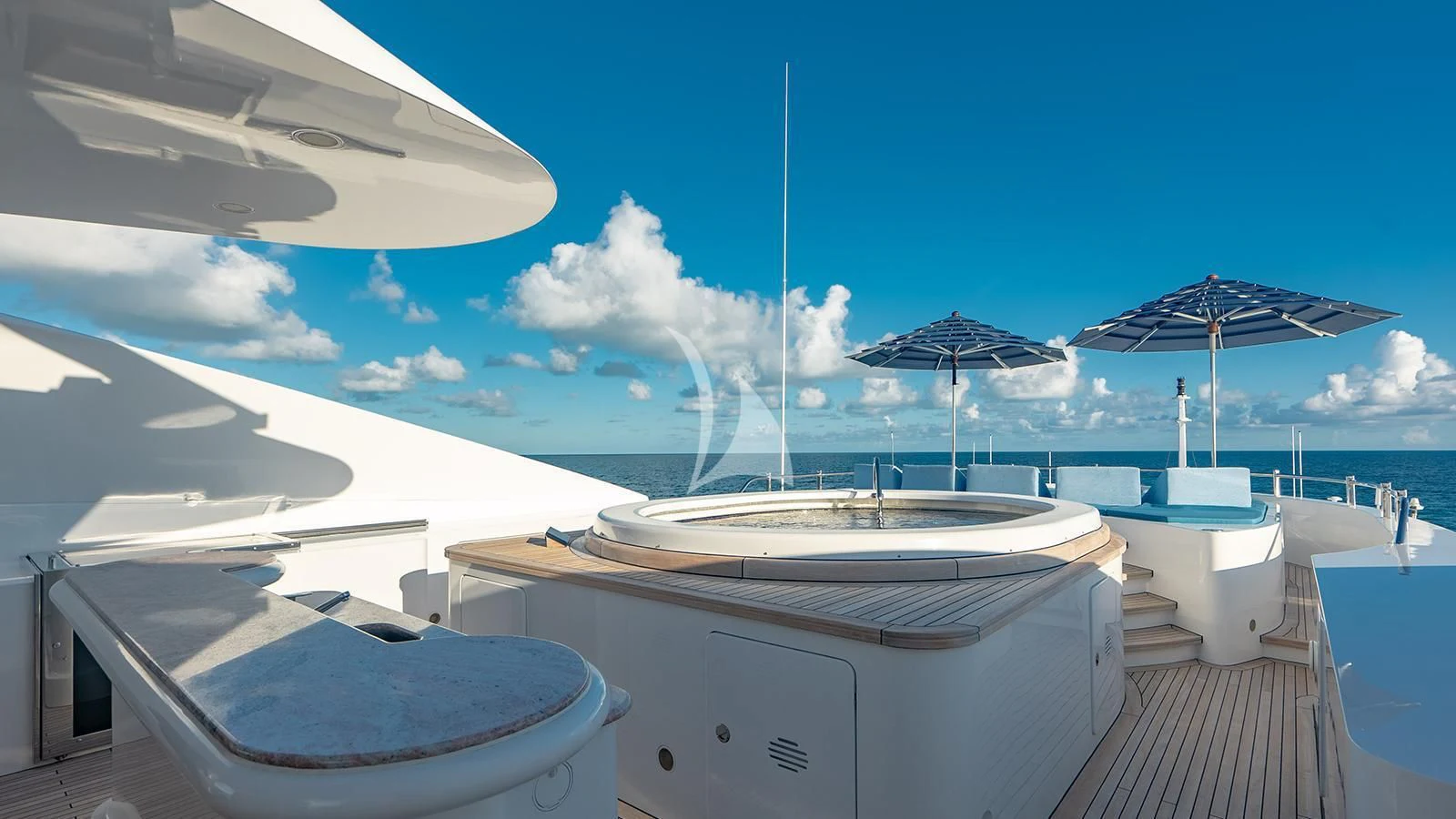 a boat on a deck aboard NEXT CHAPTER Yacht for Sale
