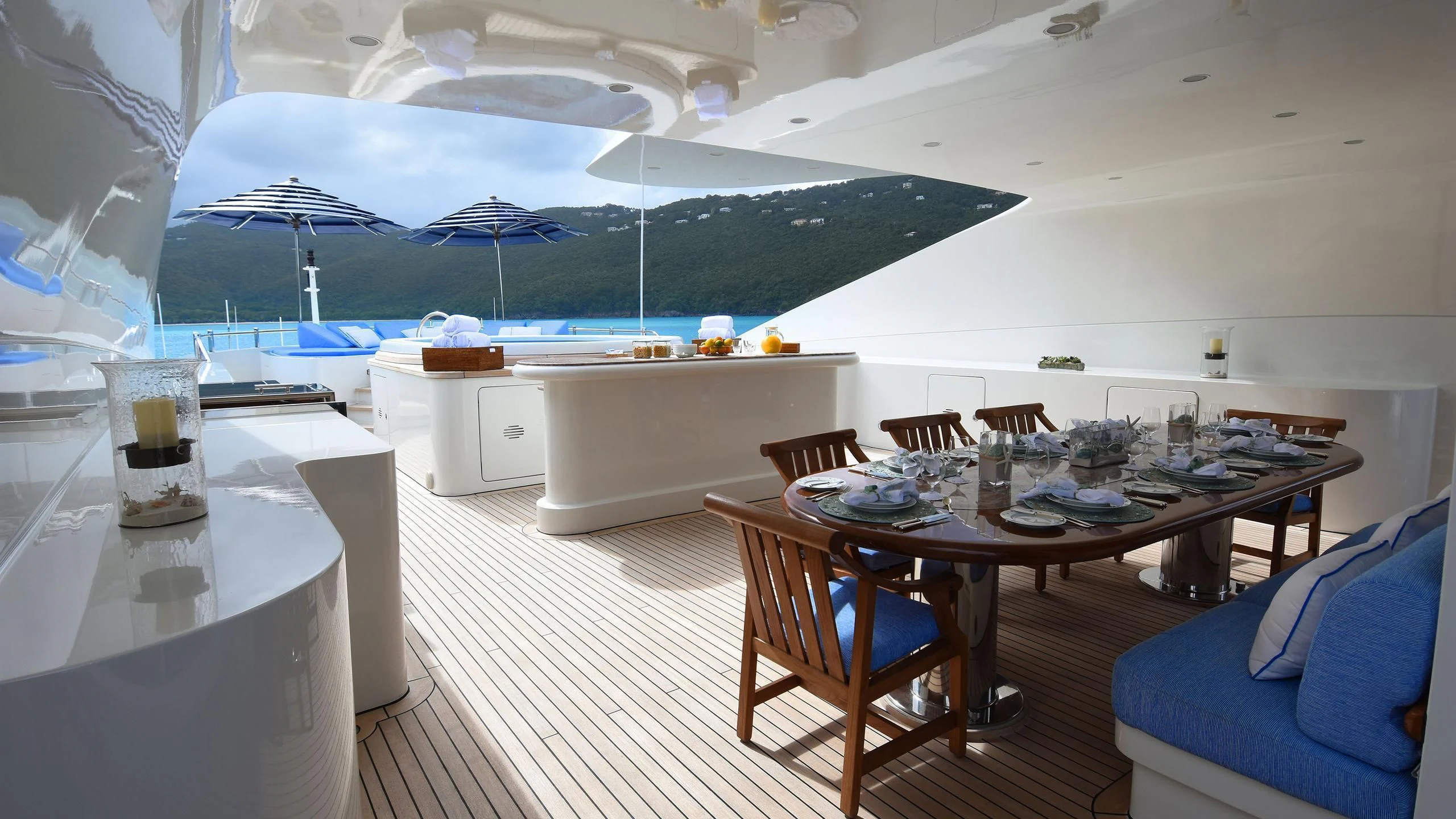 a room with a table and chairs aboard NEXT CHAPTER Yacht for Sale