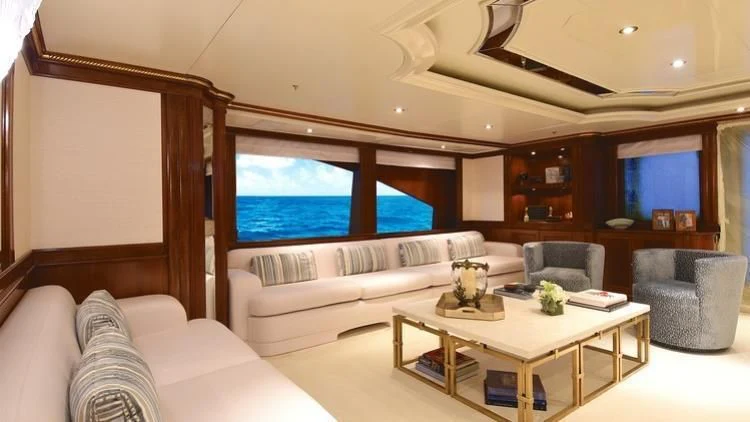 a living room with a large window aboard NEXT CHAPTER Yacht for Sale