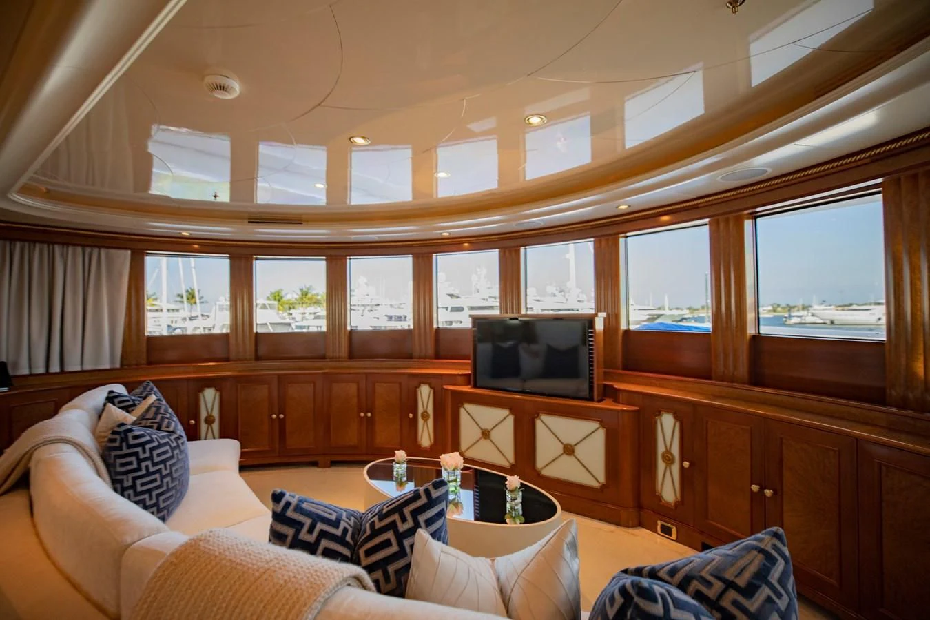 a room with a couch and a television aboard NEXT CHAPTER Yacht for Sale