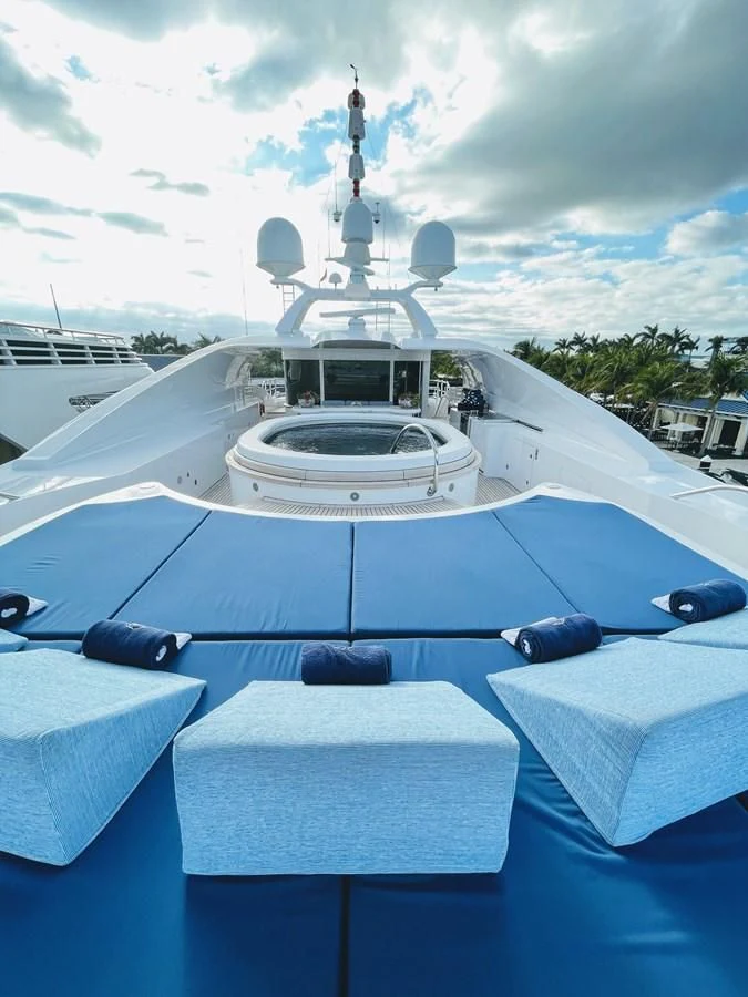 a boat with a statue on top aboard NEXT CHAPTER Yacht for Sale