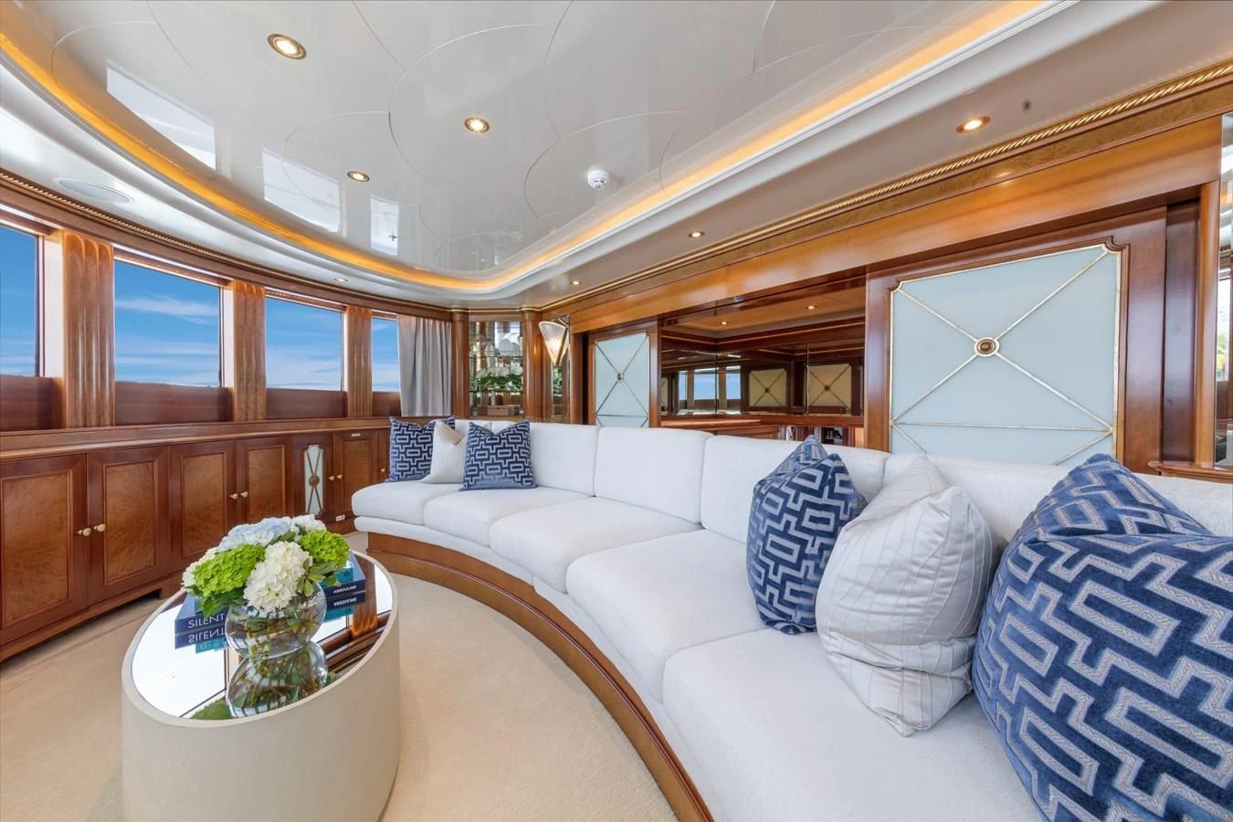 a large living room with a large window aboard NEXT CHAPTER Yacht for Sale