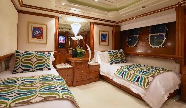 a room with two beds aboard NEXT CHAPTER Yacht for Sale