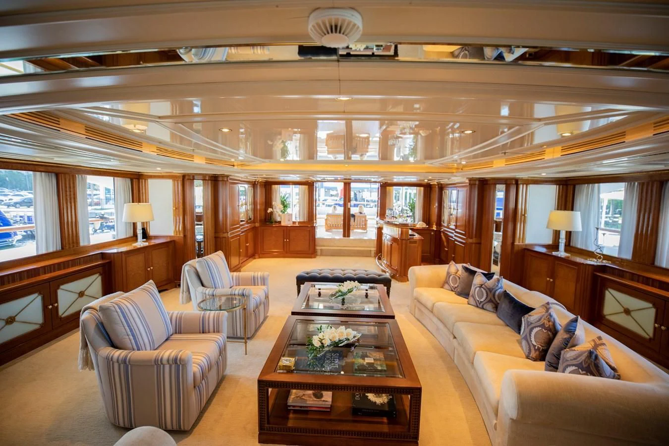 a living room with a large window aboard NEXT CHAPTER Yacht for Sale