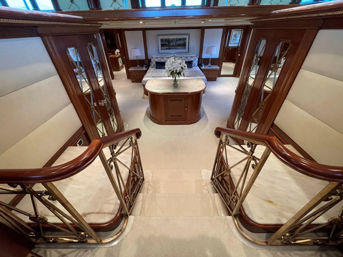 a room with a table and chairs aboard NEXT CHAPTER Yacht for Sale