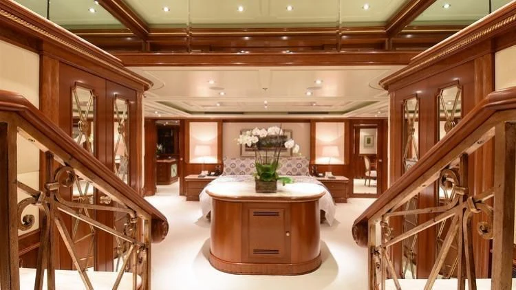 a room with a table and chairs aboard NEXT CHAPTER Yacht for Sale