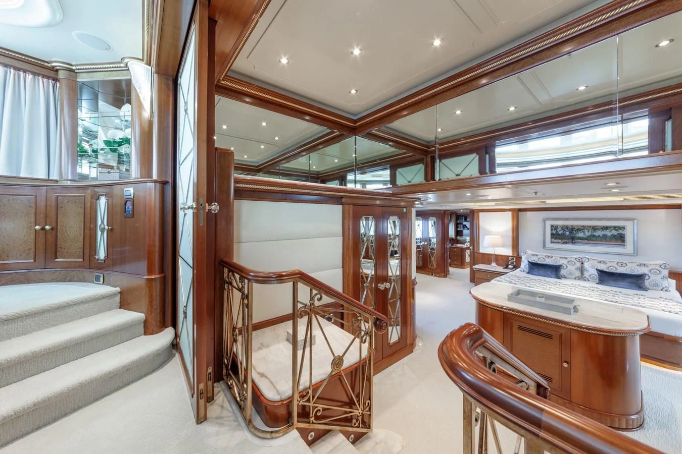 a room with a bed and a desk aboard NEXT CHAPTER Yacht for Sale