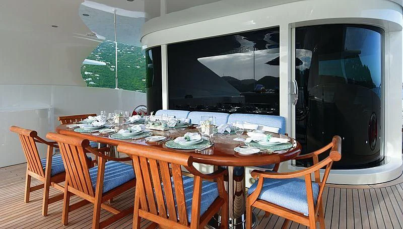 a dining table set for a family dinner aboard NEXT CHAPTER Yacht for Sale