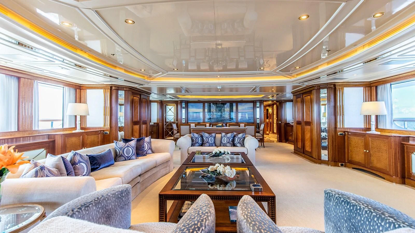 a living room with a large glass window aboard NEXT CHAPTER Yacht for Sale