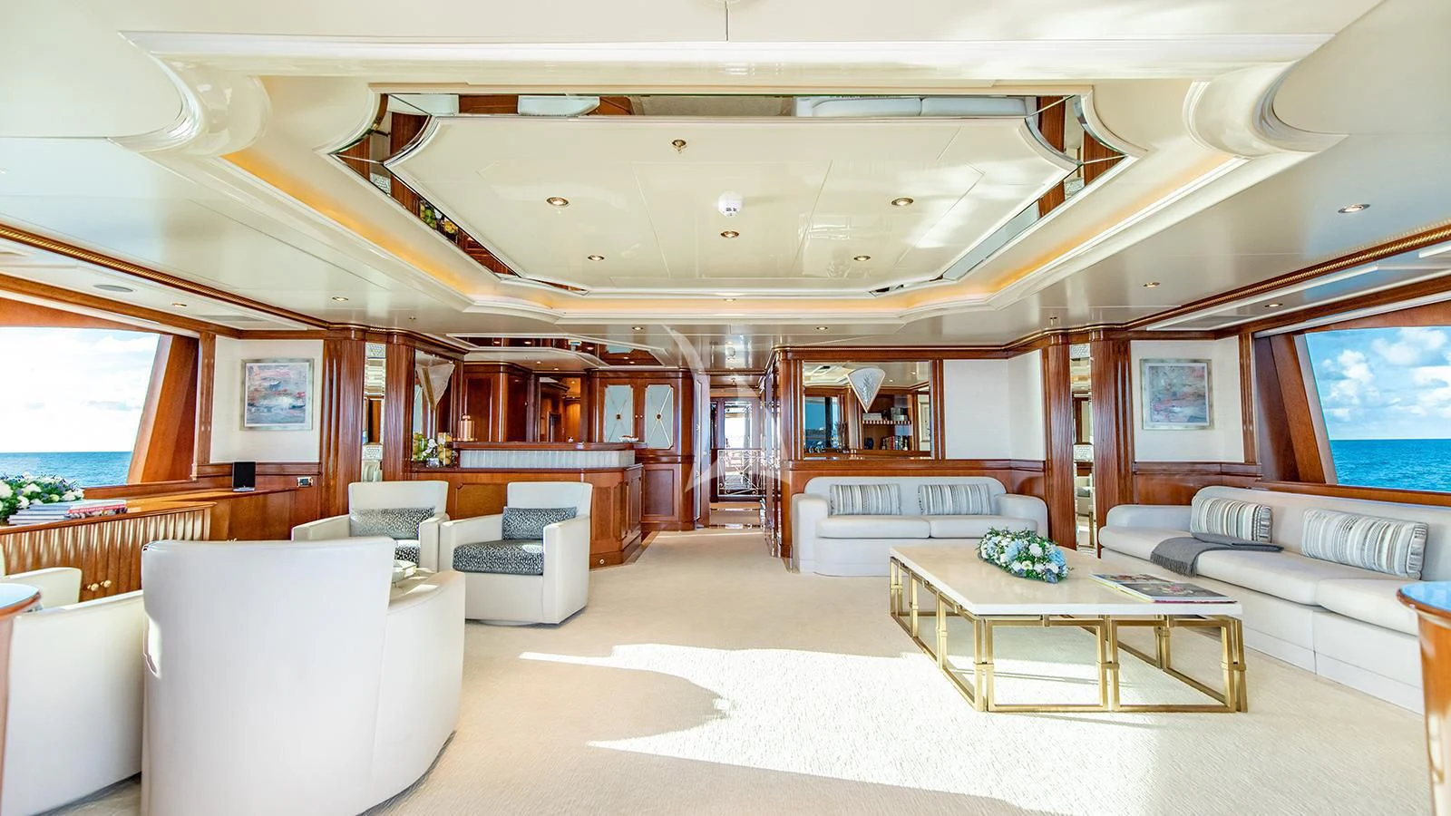 a large living room with a large window aboard NEXT CHAPTER Yacht for Sale