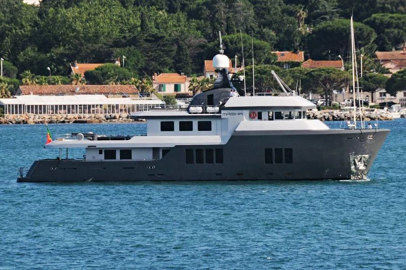 a large ship in the water aboard BONUM Yacht for Sale