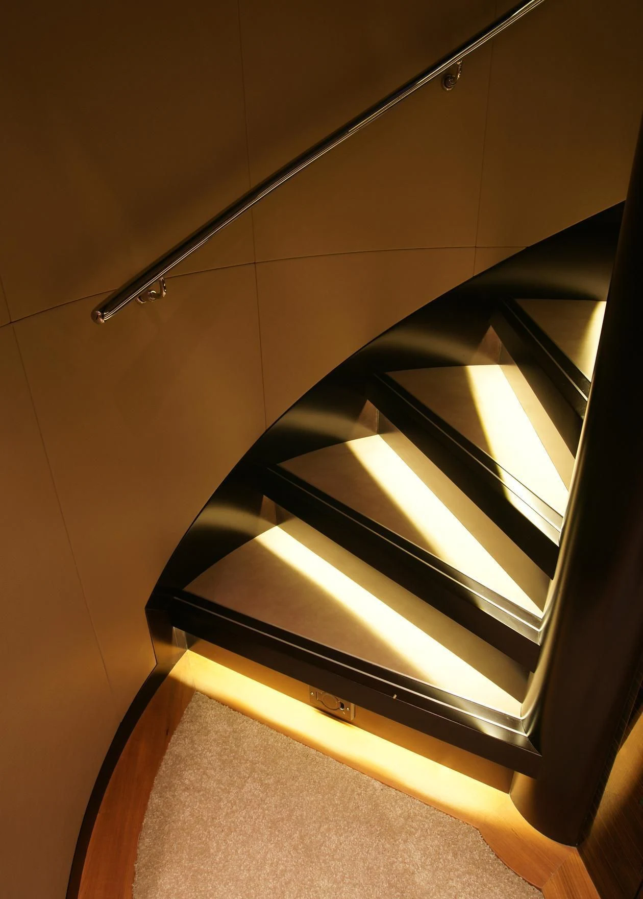 a metal spiral staircase aboard OCEAN CLUB Yacht for Sale