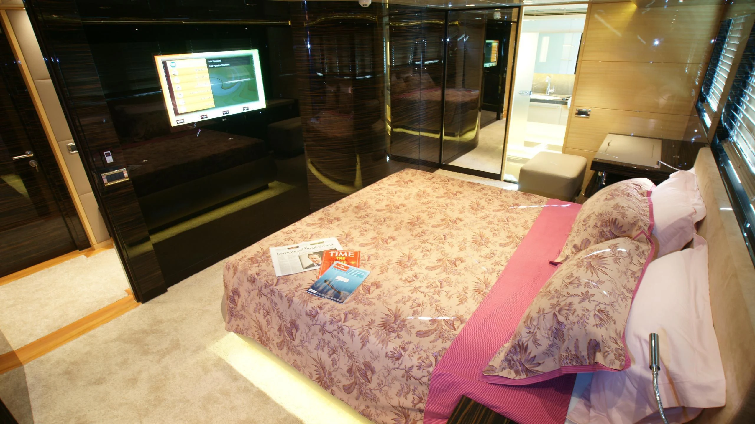 a bed in a room aboard OCEAN CLUB Yacht for Sale