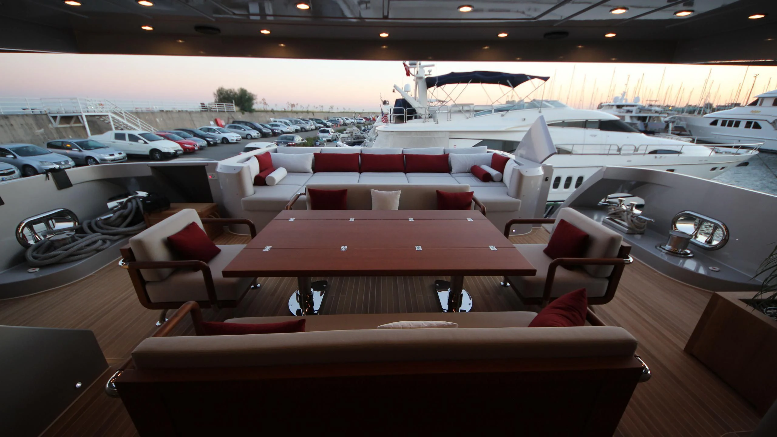 a room with a row of seats aboard OCEAN CLUB Yacht for Sale
