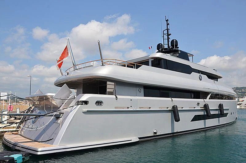 a white yacht on the water aboard OCEAN CLUB Yacht for Sale