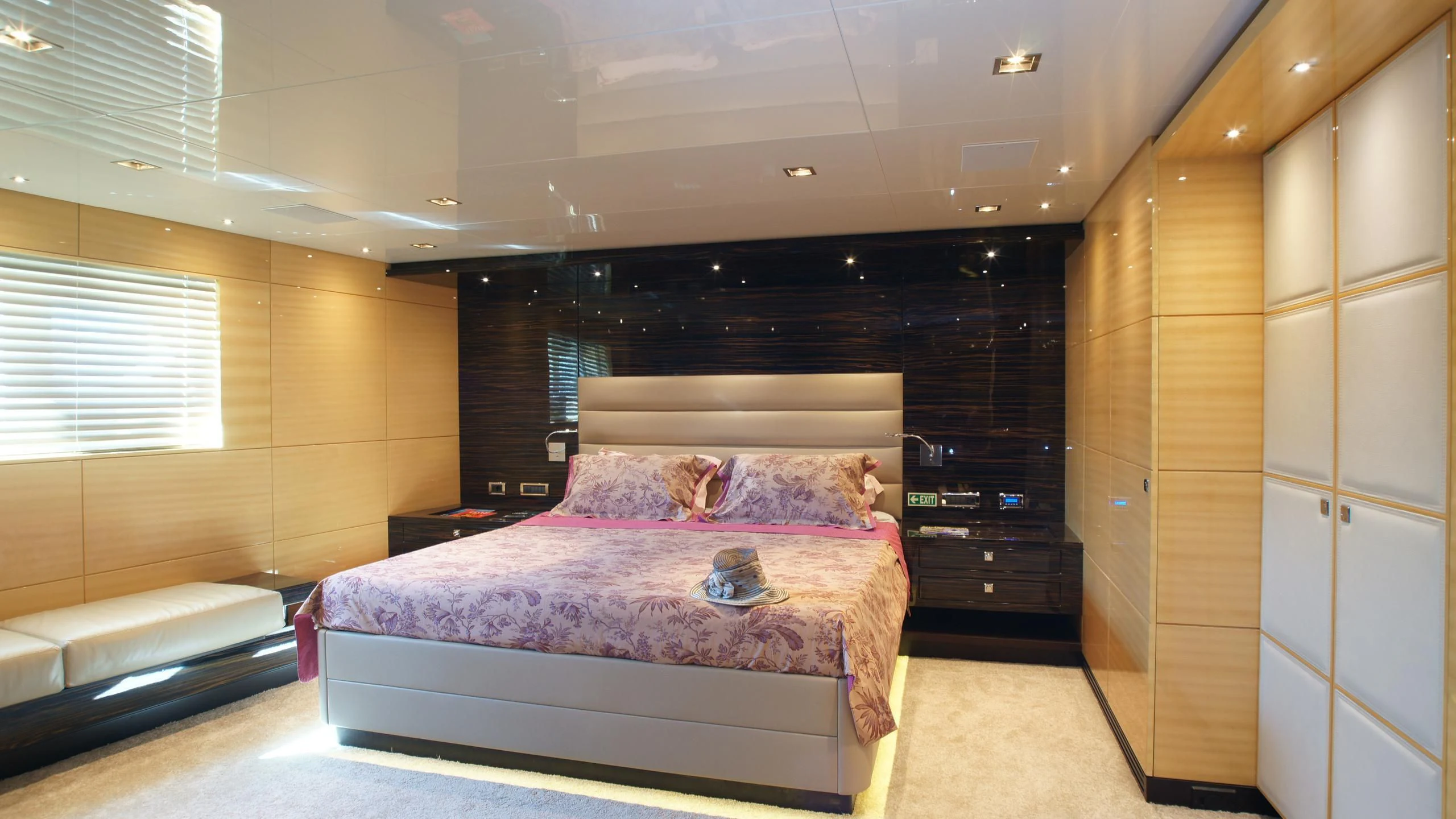 a bed in a room aboard OCEAN CLUB Yacht for Sale