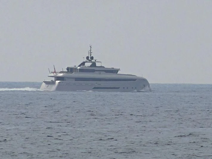 a large ship in the water aboard OCEAN CLUB Yacht for Sale