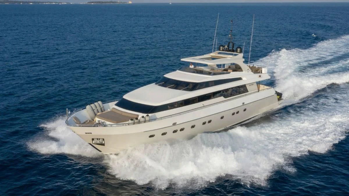 a large white boat aboard FASTER Yacht for Sale