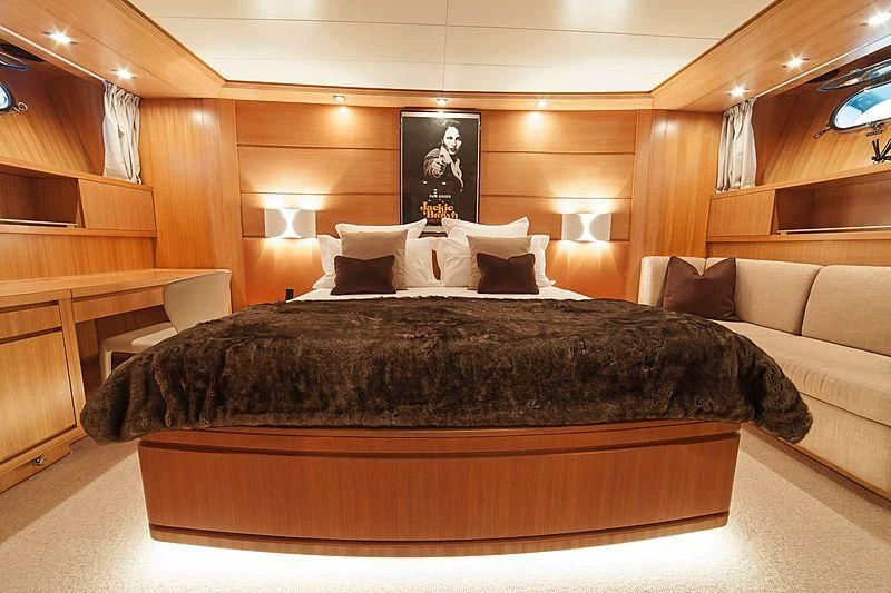 a bed in a room aboard FASTER Yacht for Sale