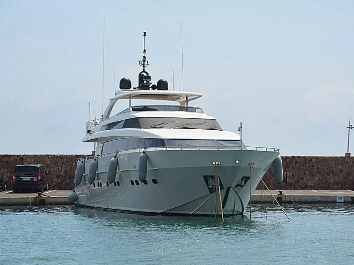 a large white boat aboard FASTER Yacht for Sale