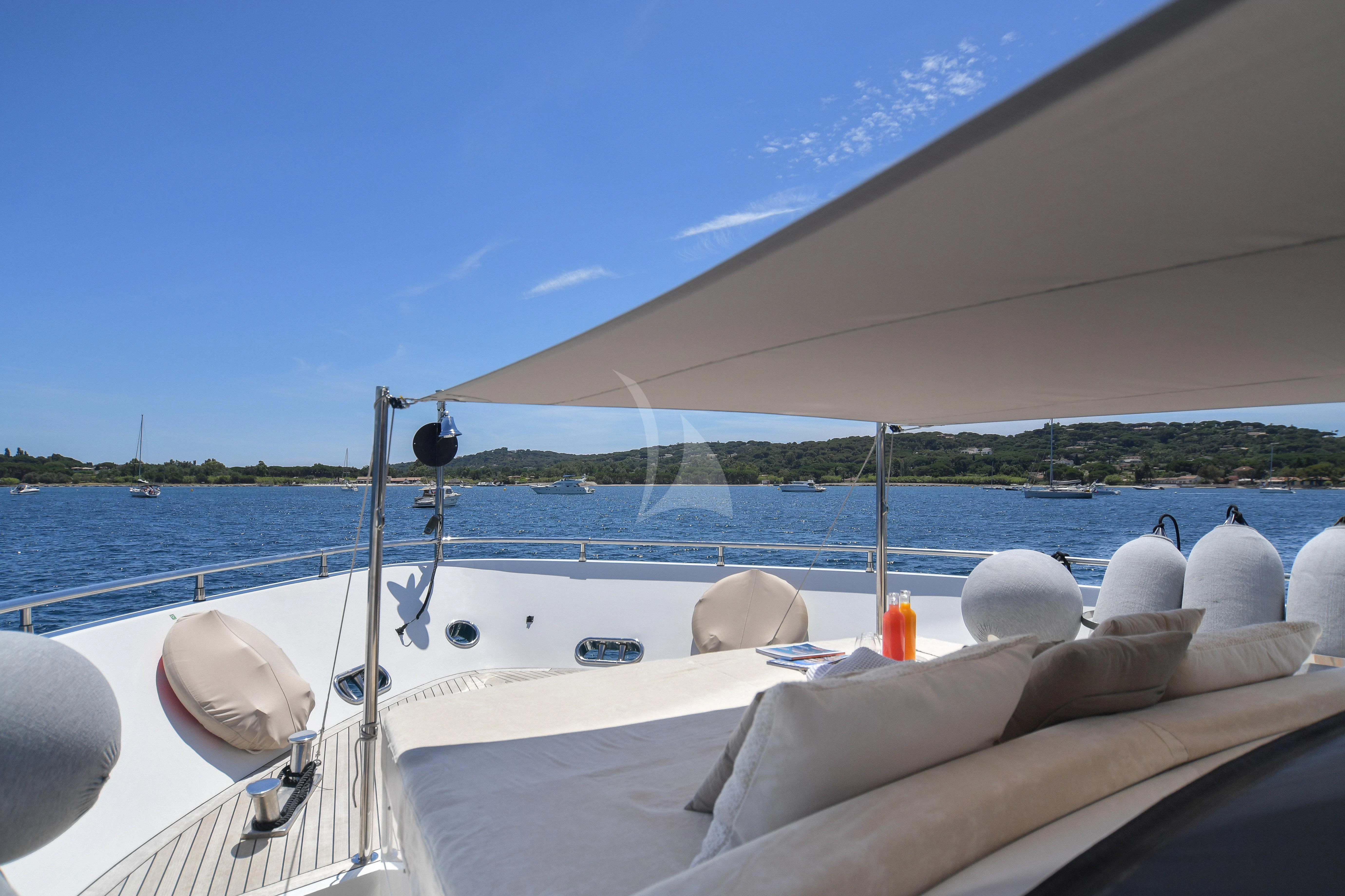 a boat with white pillows on it aboard FASTER Yacht for Sale