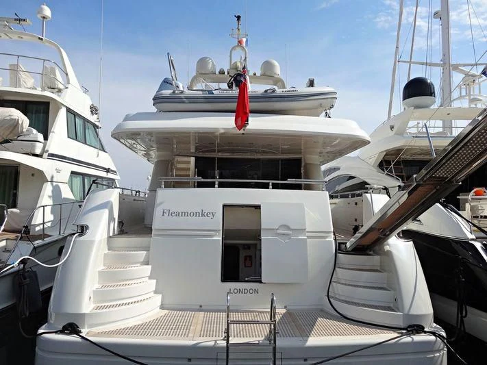 a boat with a statue on the front aboard FASTER Yacht for Sale