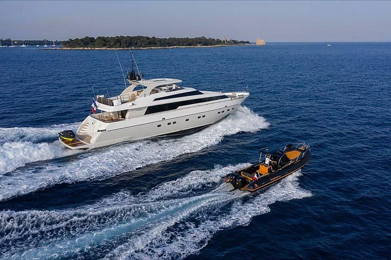 a boat and a boat in the water aboard FASTER Yacht for Sale