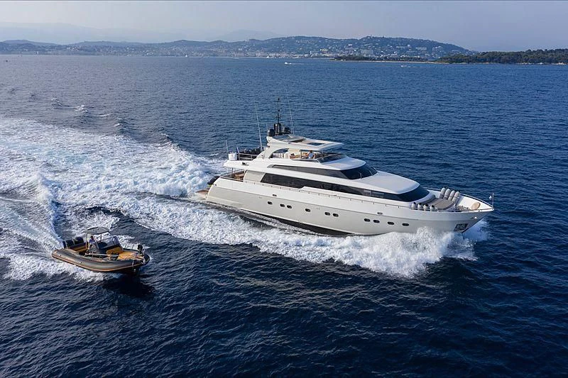 a boat and a boat in the water aboard FASTER Yacht for Sale