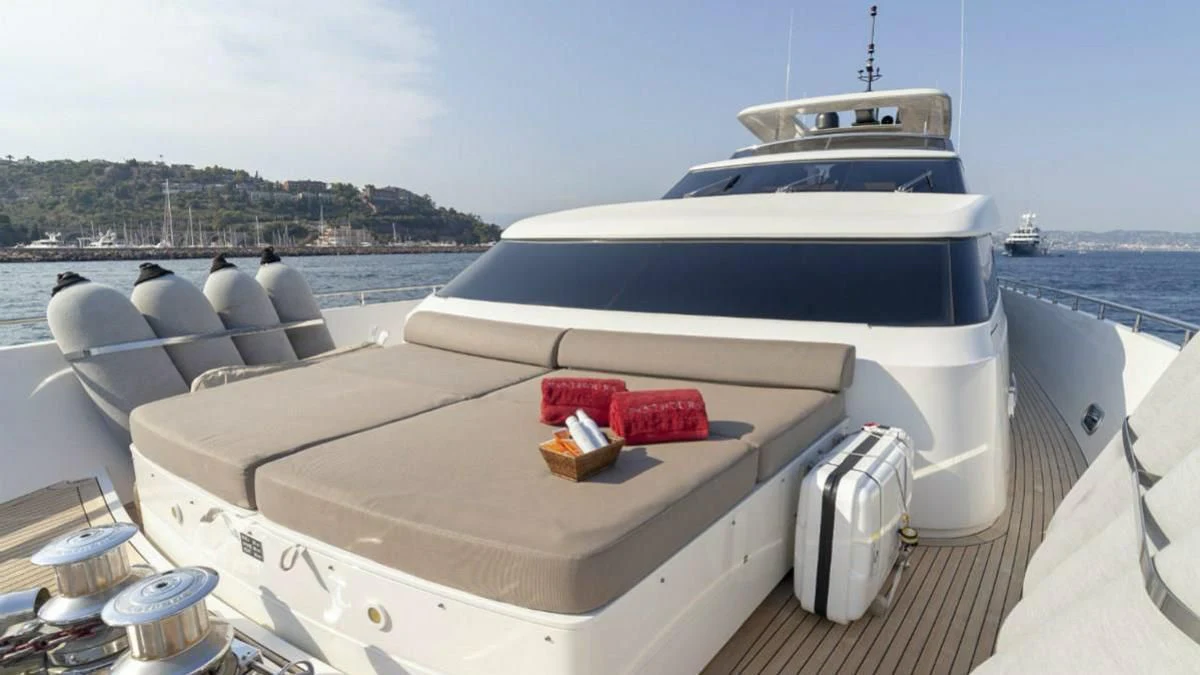 a boat on a deck aboard FASTER Yacht for Sale