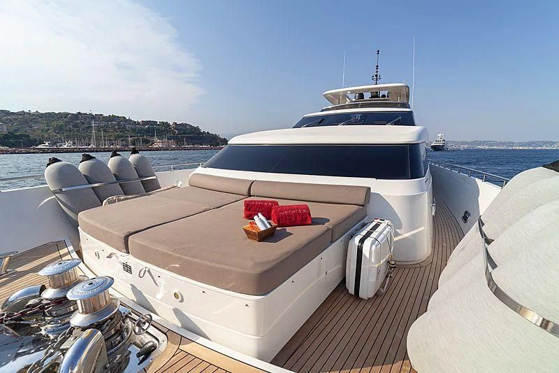 a boat on a deck aboard FASTER Yacht for Sale