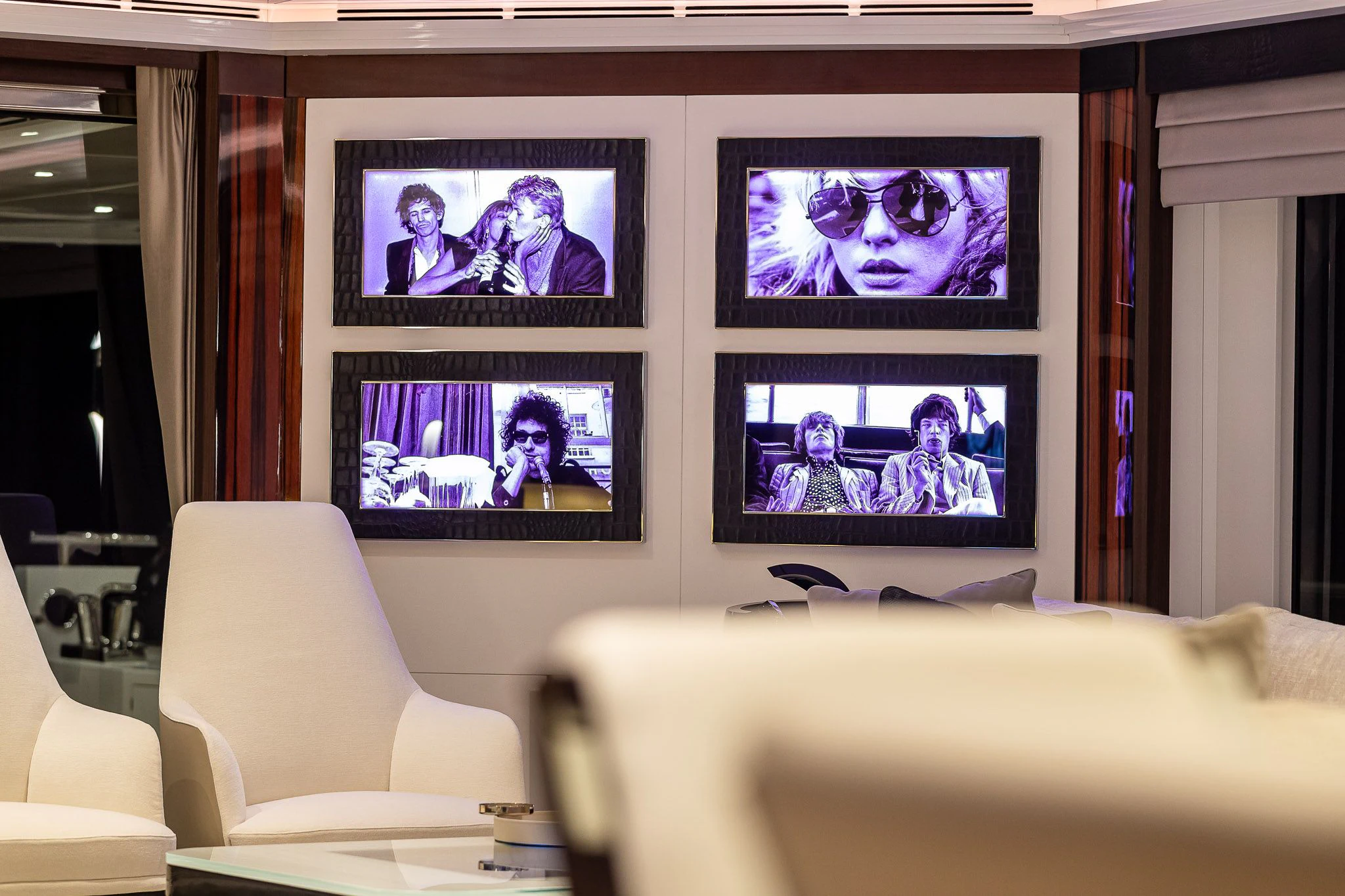 a room with a couch and a television on the wall aboard KING BABY Yacht for Sale