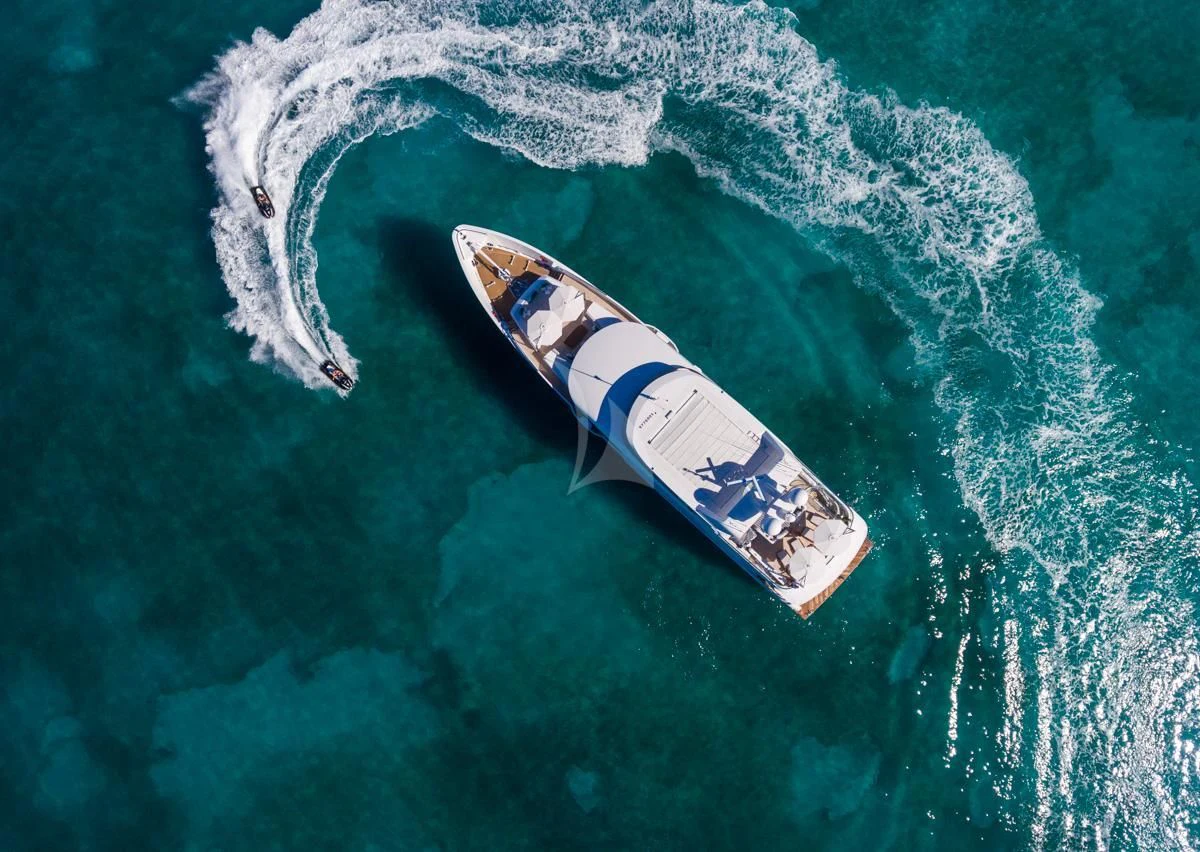 a small boat in the water aboard KING BABY Yacht for Sale