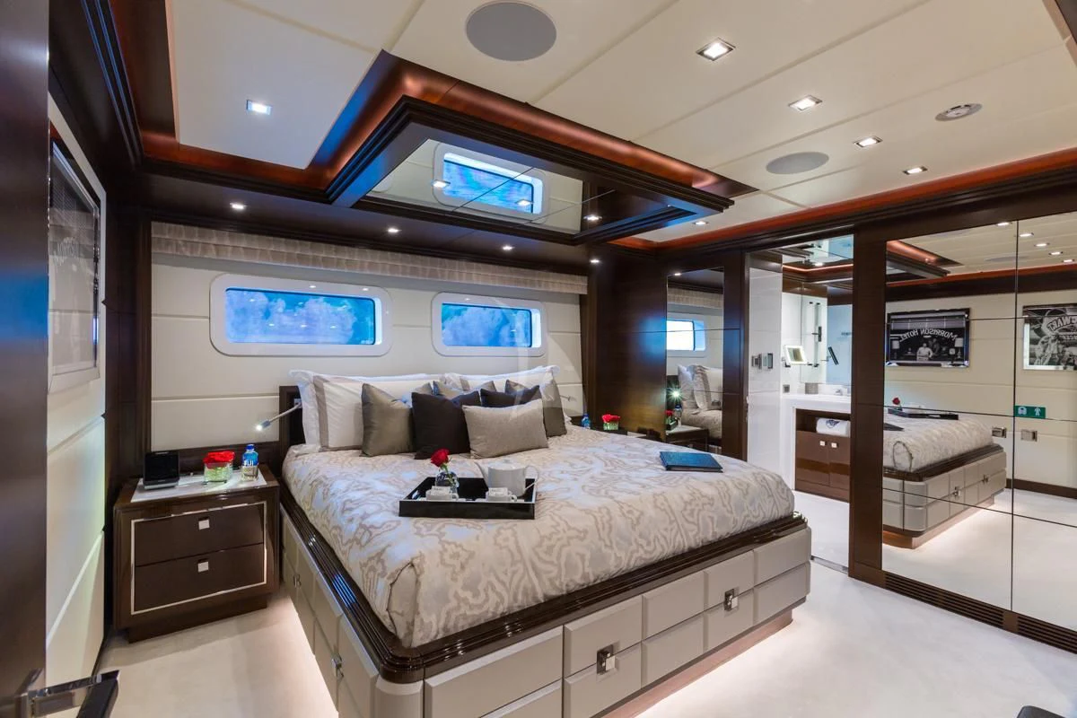 a room with a bed and a desk aboard KING BABY Yacht for Sale
