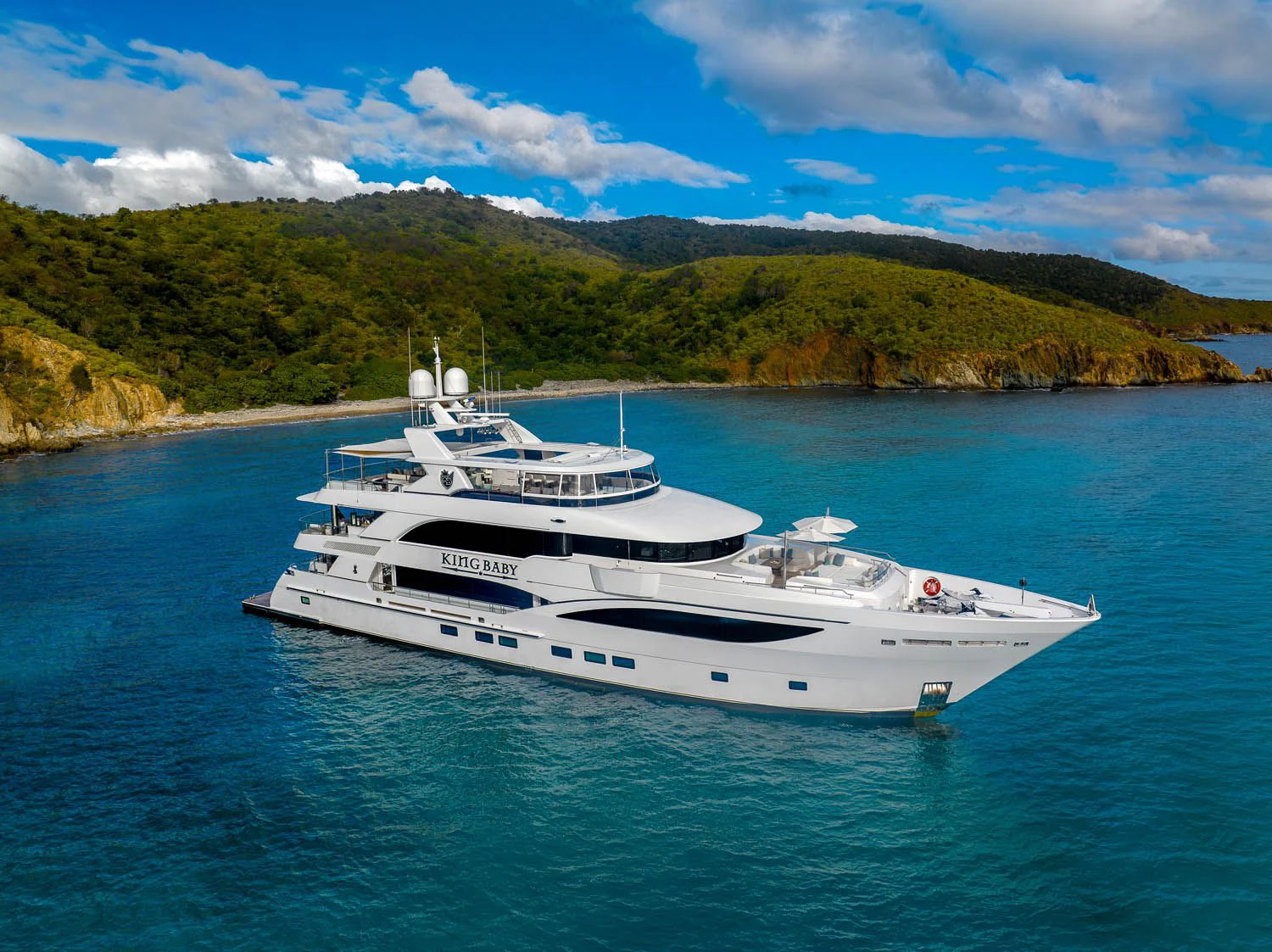 a white yacht on the water aboard KING BABY Yacht for Sale