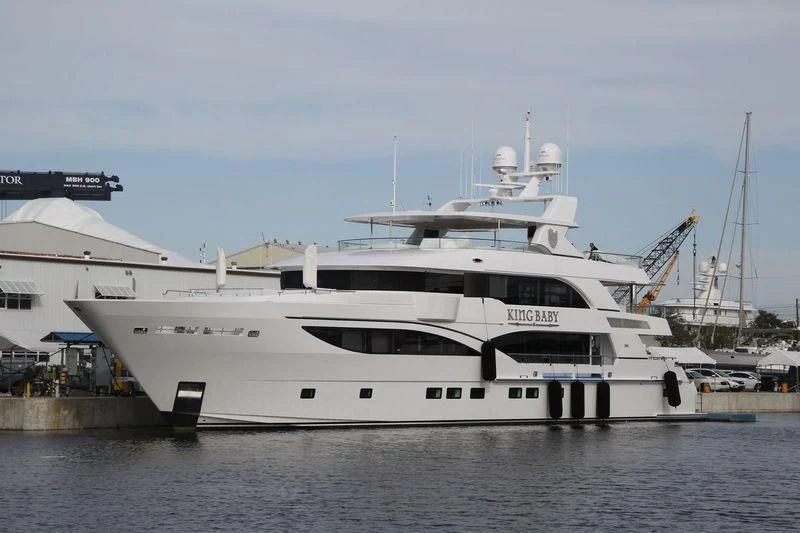 a large white boat in the water aboard KING BABY Yacht for Sale