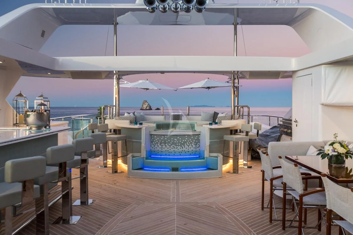 a room with a table chairs and a pool table aboard KING BABY Yacht for Sale