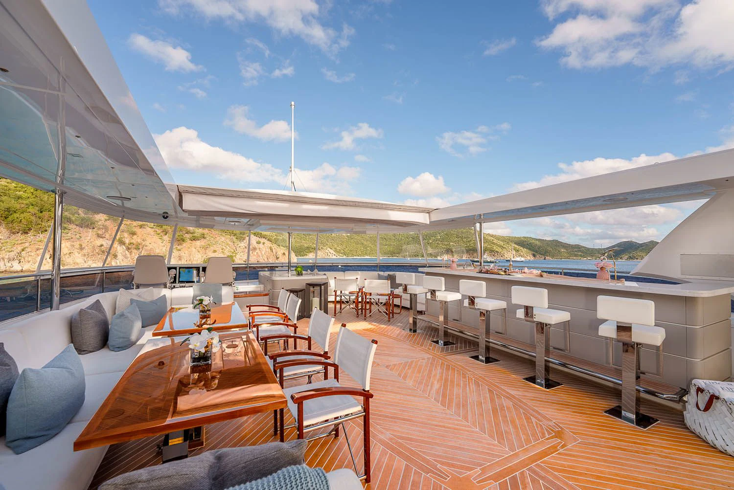 a deck with a view of the ocean and the ocean aboard KING BABY Yacht for Sale