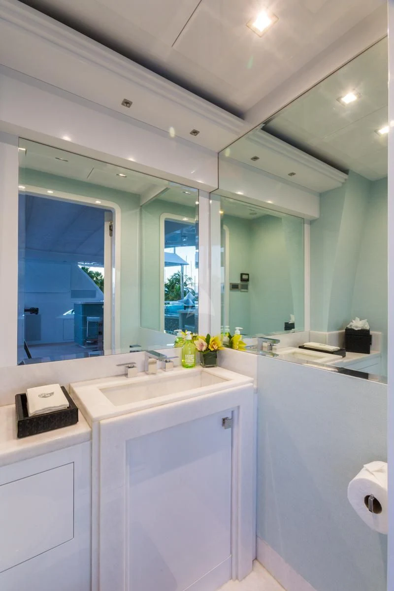 a bathroom with a large mirror aboard KING BABY Yacht for Sale
