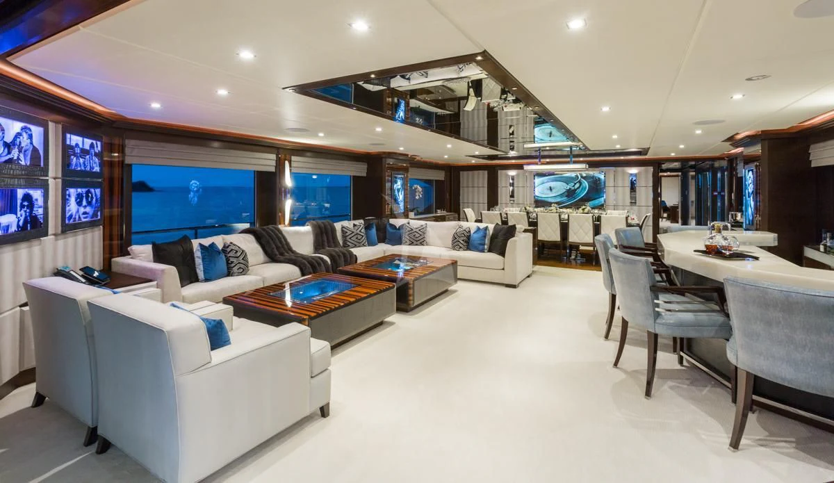 a room with a couch and a table and a tv aboard KING BABY Yacht for Sale
