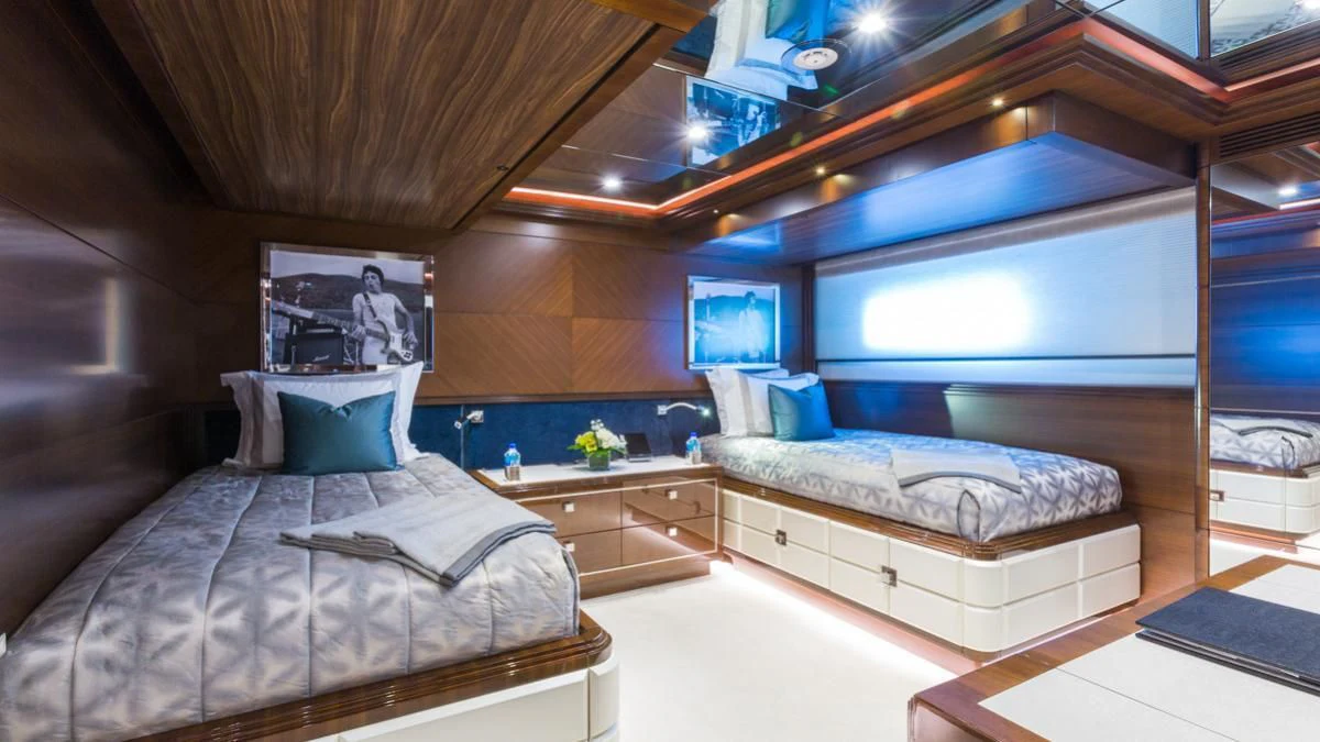 a room with a bed and a tv aboard KING BABY Yacht for Sale