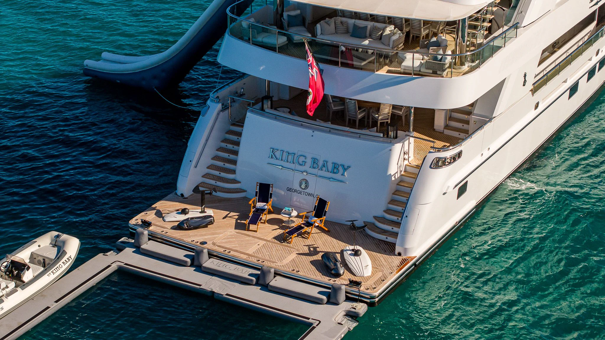 a large white boat on the water aboard KING BABY Yacht for Sale