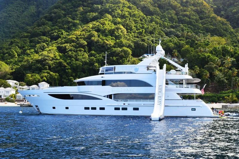 a white yacht on the water aboard KING BABY Yacht for Sale
