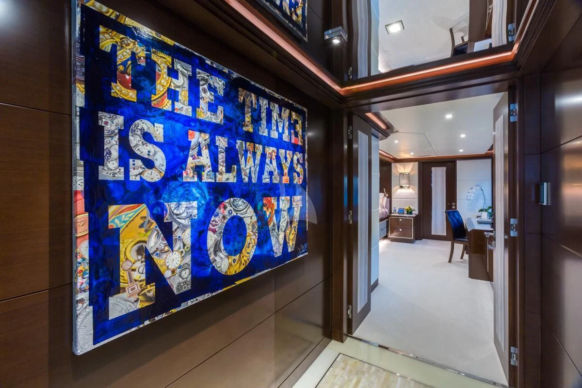 a large blue sign on a wall aboard KING BABY Yacht for Sale
