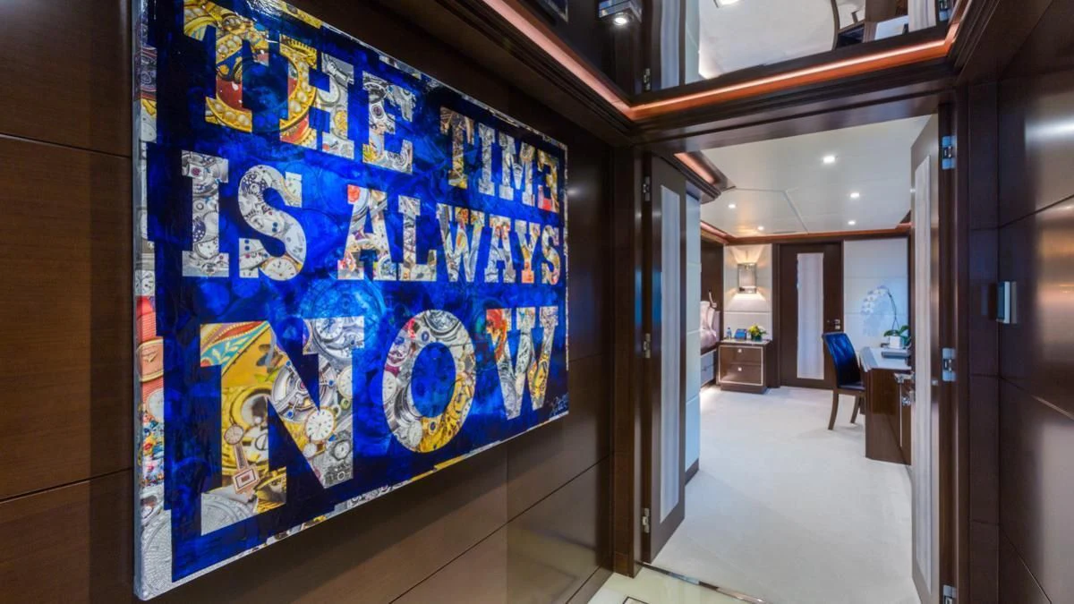 a room with a blue wall aboard KING BABY Yacht for Sale