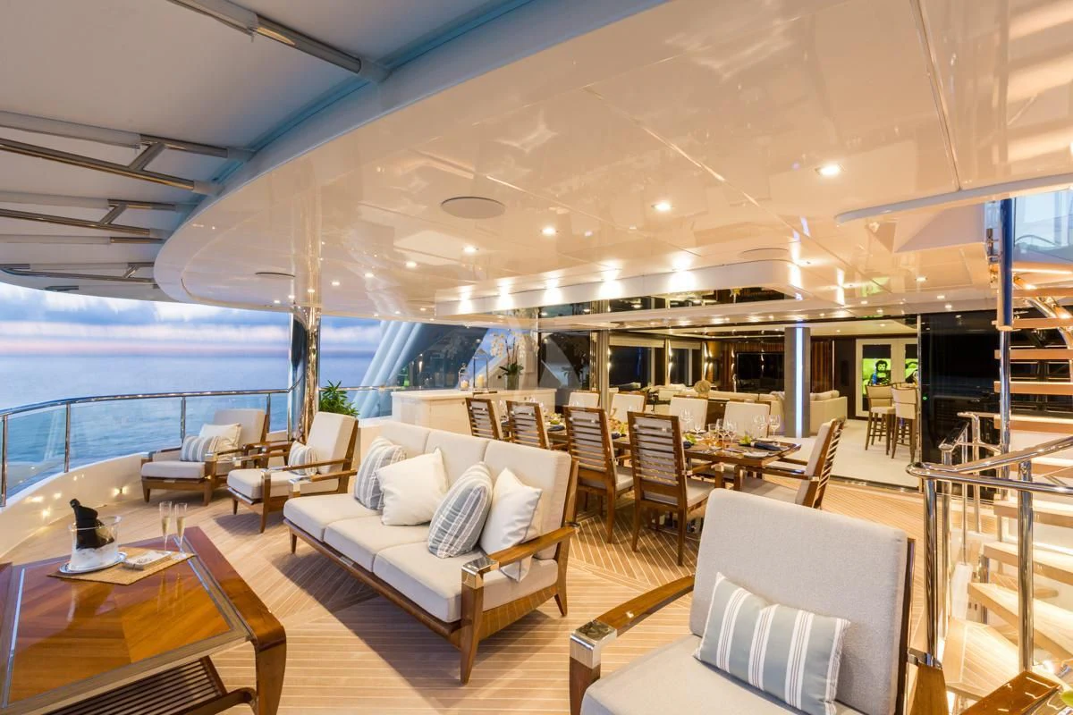 a room with a table chairs and a large window aboard KING BABY Yacht for Sale