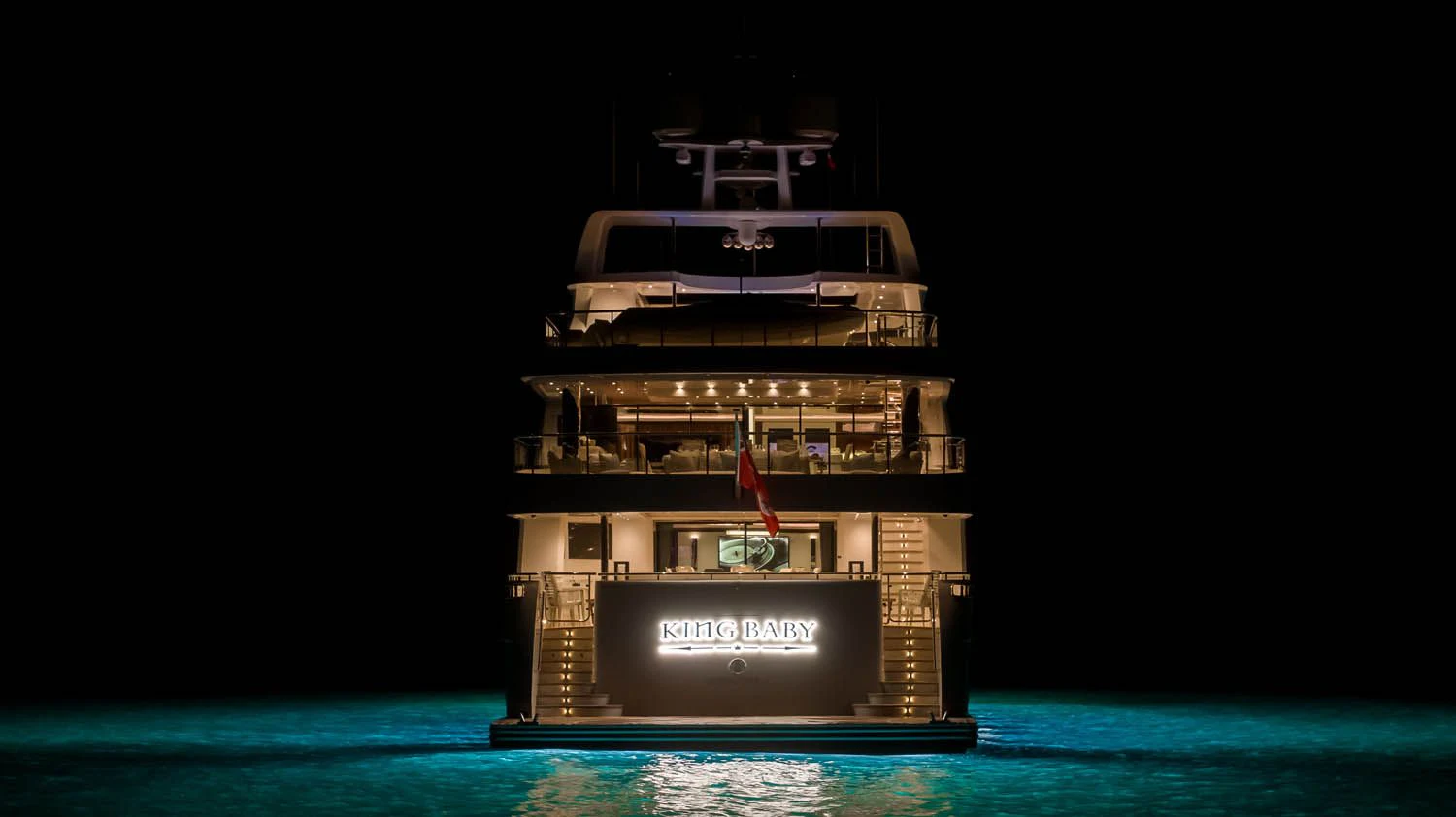 a large ship in the water aboard KING BABY Yacht for Sale