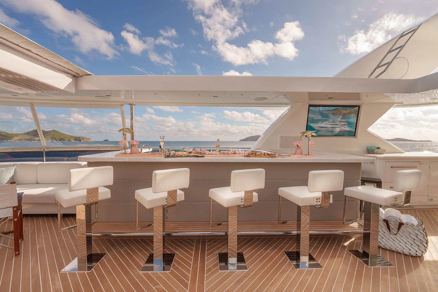 a room with chairs and a table aboard KING BABY Yacht for Sale